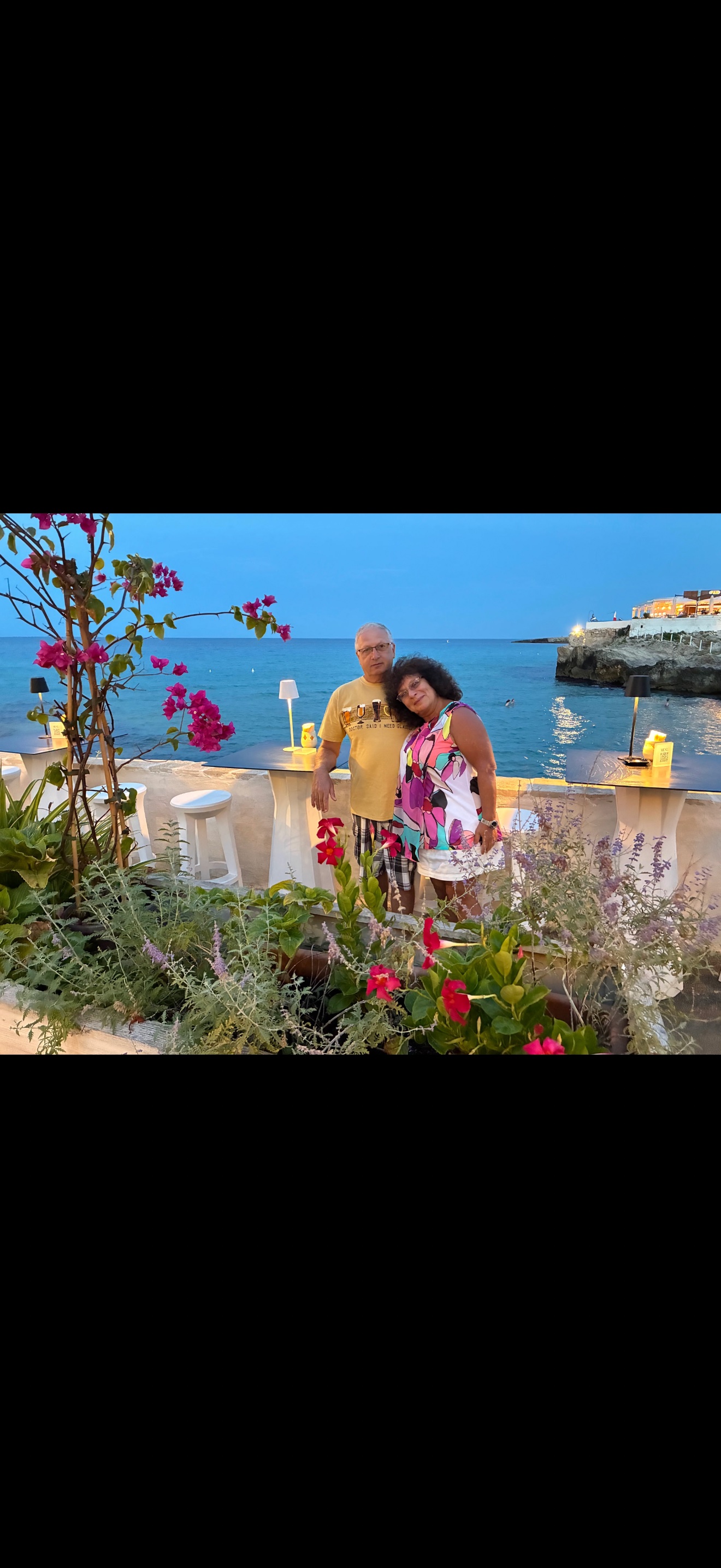 Alex and Irina by the sea at dusk